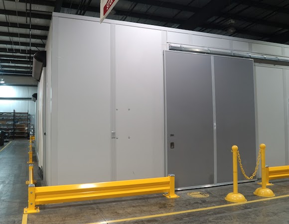 modular welding room enclosure with bi-parting doors