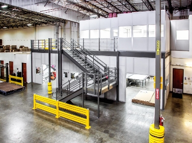 two-story mezzanine office space with observation deck