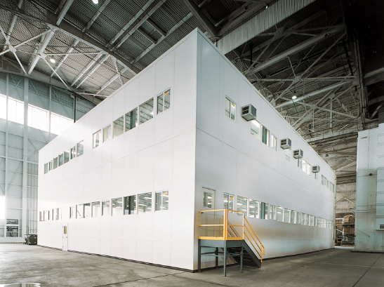 two-story office in aircraft hangar
