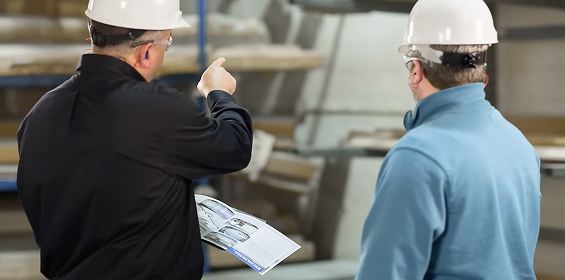engineers looking at blueprints