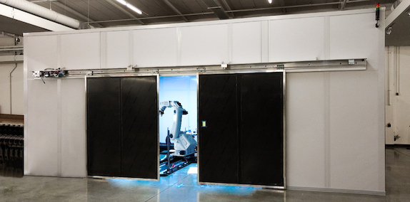 robotic welding room with oversized doors